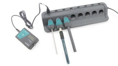 A set of three screwdrivers and two batteries.