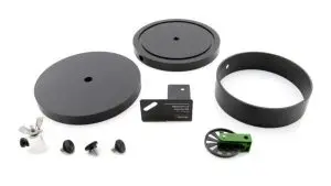 A set of parts for the black and green camera.