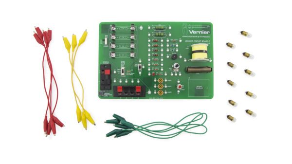 A green board with wires and some electrical components.